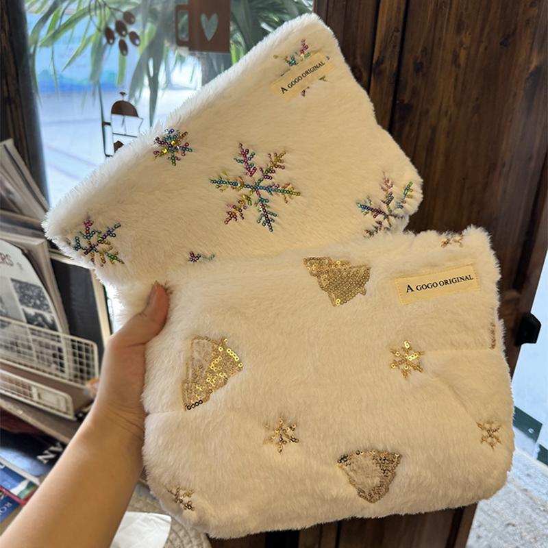 Petit Secret Fluffy Christmas makeup bags, thickened snowflake and Christmas tree gift bags, and portable storage bags for skincare products as gifts.